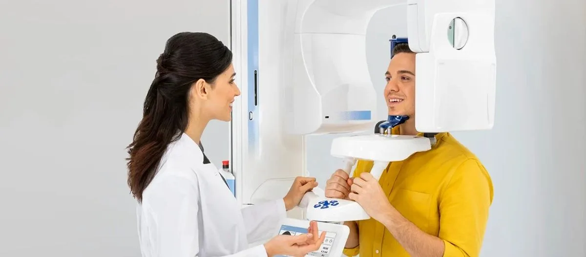 Patient being positioned in a Planmeca Pro-Max Cone Beam CT machine